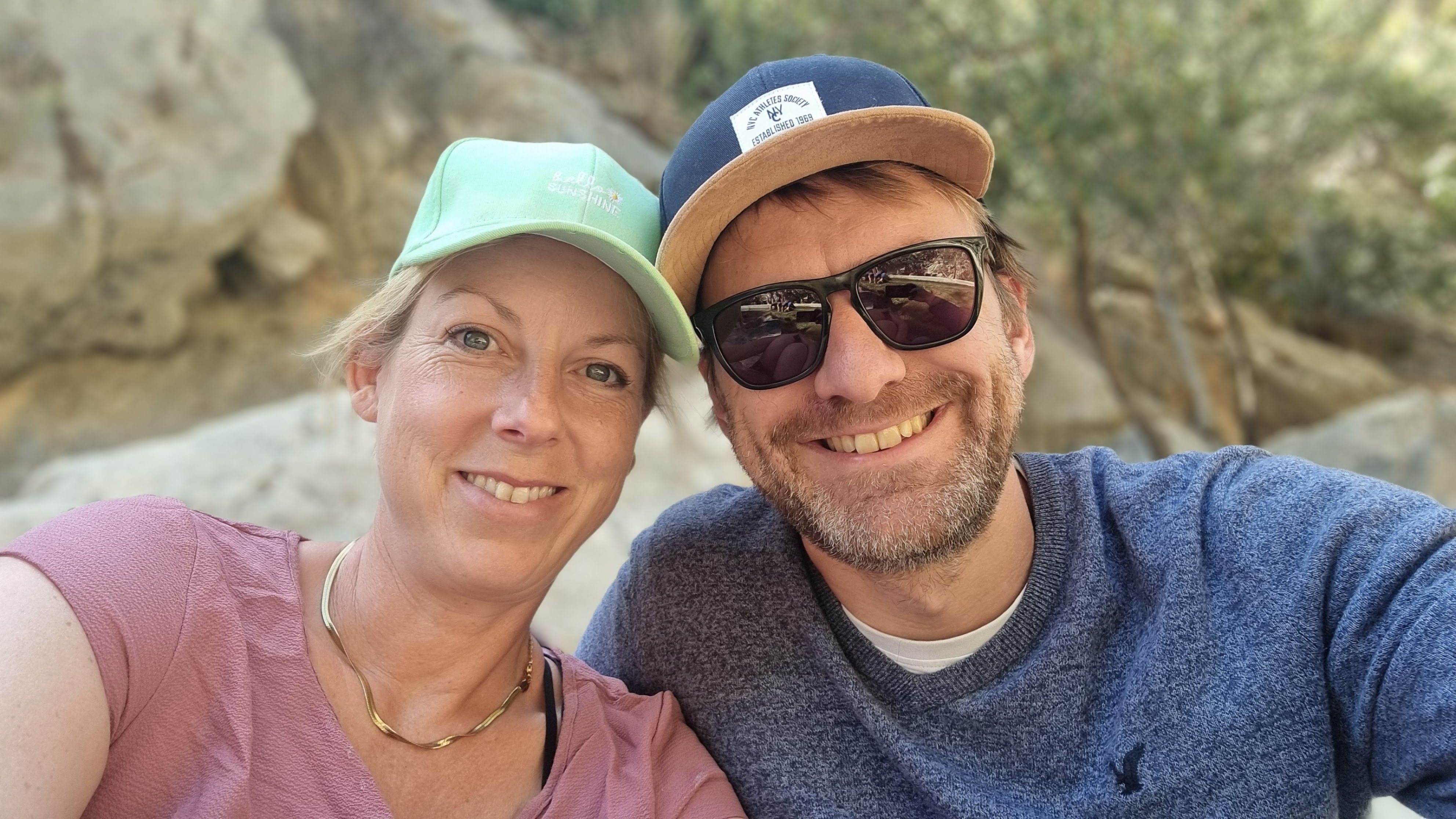 Elena and Felix smiling outdoors